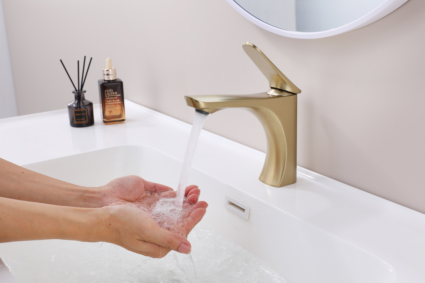 Luxury brass basin mixer tap in timeless modern bathroom interior – Riva Living